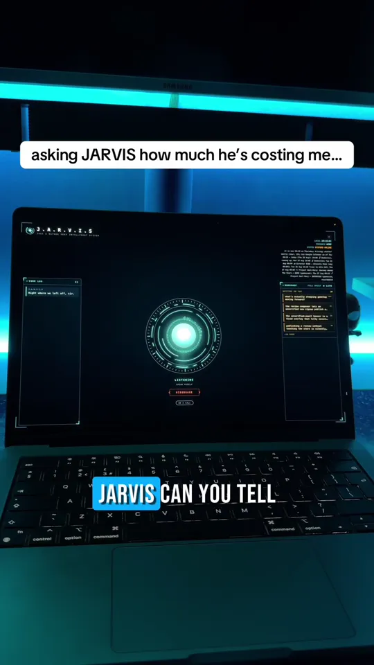 Still from the cost reel: the laptop glass with the JARVIS core, asked what he costs to run